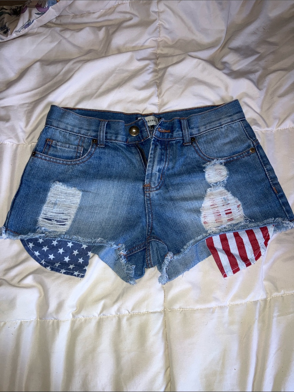 Women's Distressed High-Rise Denim Shorts with Flag Patch Detail - Blue